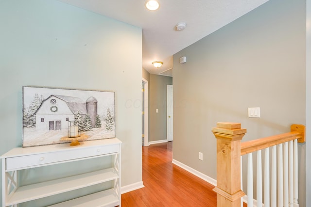 7029 Post Preserve Blvd, Dublin, OH 43016 - hallway featuring an upstairs landing and light wood finished floors