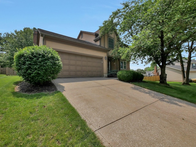 1380 Hanbury Ct, Gahanna, OH 43230 - view of front of house featuring stucco siding, a garage, a front yard, and concrete driveway