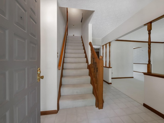 1380 Hanbury Ct, Gahanna, OH 43230 - stairway featuring baseboards and a textured ceiling