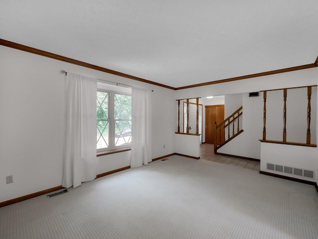 1380 Hanbury Ct, Gahanna, OH 43230 - carpeted empty room featuring stairs and ornamental molding