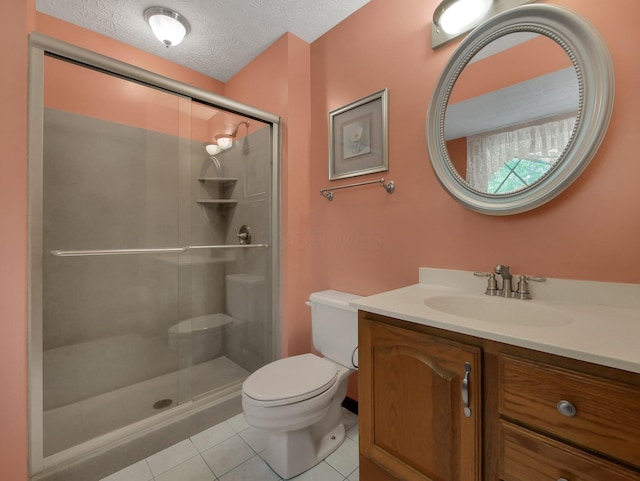 1380 Hanbury Ct, Gahanna, OH 43230 - bathroom with vanity, a stall shower, tile patterned floors, and a textured ceiling