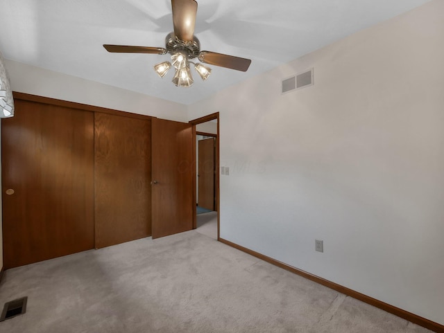 1380 Hanbury Ct, Gahanna, OH 43230 - unfurnished bedroom featuring carpet, a closet, and a ceiling fan