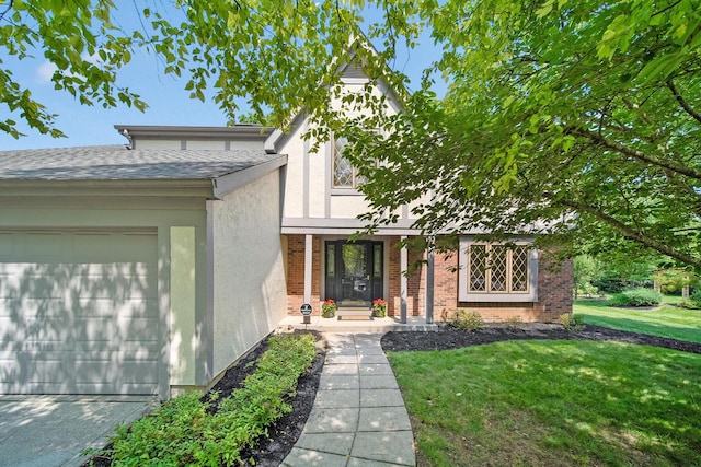 6978 Ernest Way, Dublin, OH 43017 - view of front facade with stucco siding, a garage, a front yard, brick siding, and a shingled roof