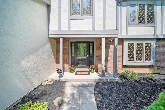 6978 Ernest Way, Dublin, OH 43017 - view of exterior entry with stucco siding and brick siding