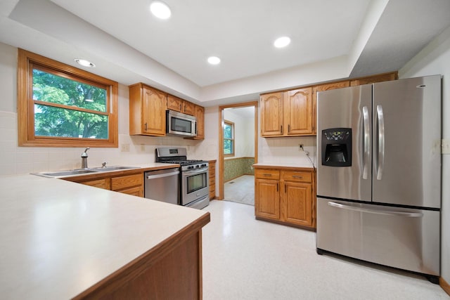 6978 Ernest Way, Dublin, OH 43017 - kitchen with stainless steel appliances, plenty of natural light, light countertops, and recessed lighting