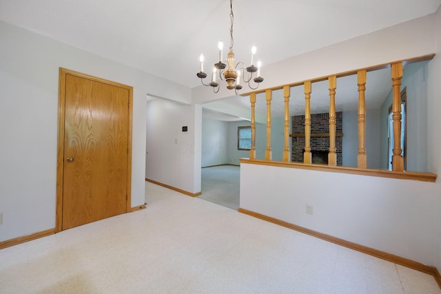 6978 Ernest Way, Dublin, OH 43017 - empty room featuring a chandelier and carpet floors