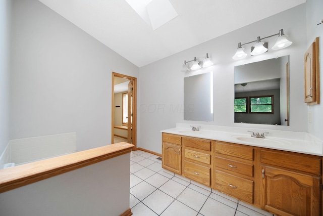 6978 Ernest Way, Dublin, OH 43017 - full bath featuring a skylight, double vanity, vaulted ceiling, and tile patterned flooring