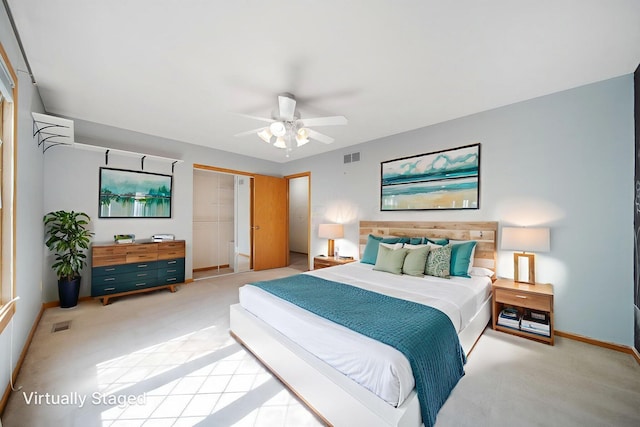 6978 Ernest Way, Dublin, OH 43017 - bedroom featuring a closet, light colored carpet, and ceiling fan