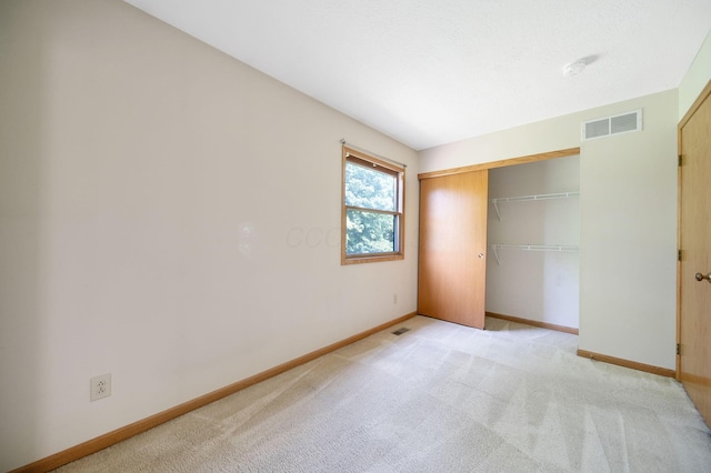 6978 Ernest Way, Dublin, OH 43017 - unfurnished bedroom featuring light colored carpet and a closet