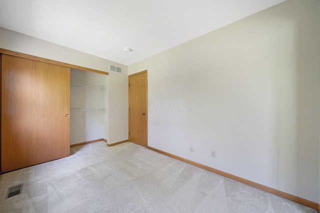 6978 Ernest Way, Dublin, OH 43017 - unfurnished bedroom featuring light carpet and a closet