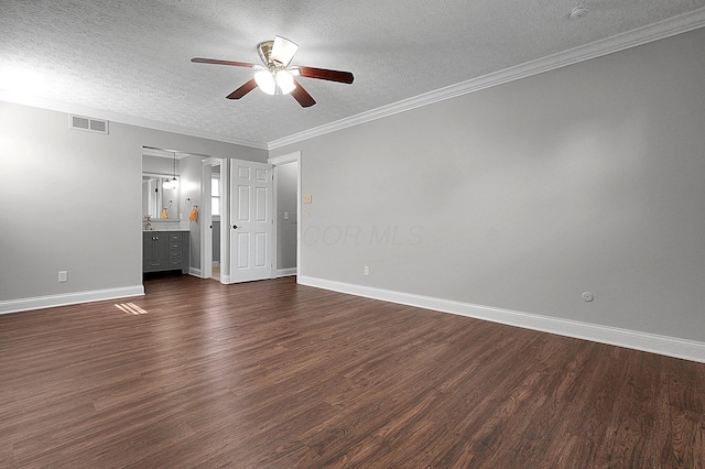 2709 Patrick Ave, Columbus, OH 43231 - unfurnished bedroom with a textured ceiling, dark wood-type flooring, ensuite bath, crown molding, and ceiling fan