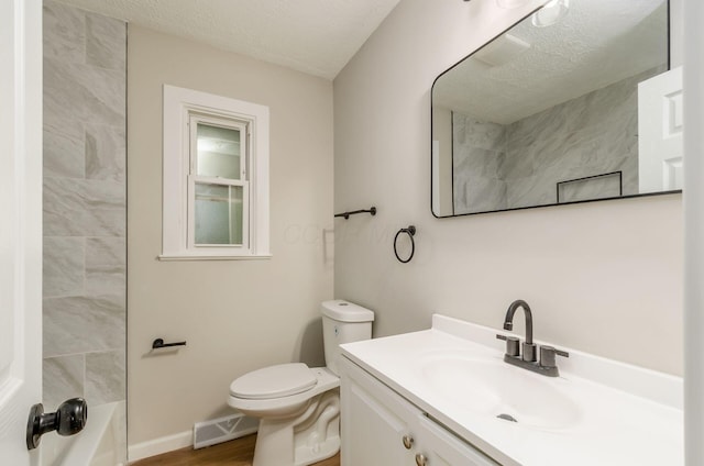 4965 Pennhurst Ave, Columbus, OH 43228 - full bathroom with vanity, a textured ceiling, and wood finished floors