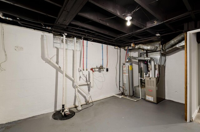4965 Pennhurst Ave, Columbus, OH 43228 - unfinished below grade area featuring water heater and heating unit