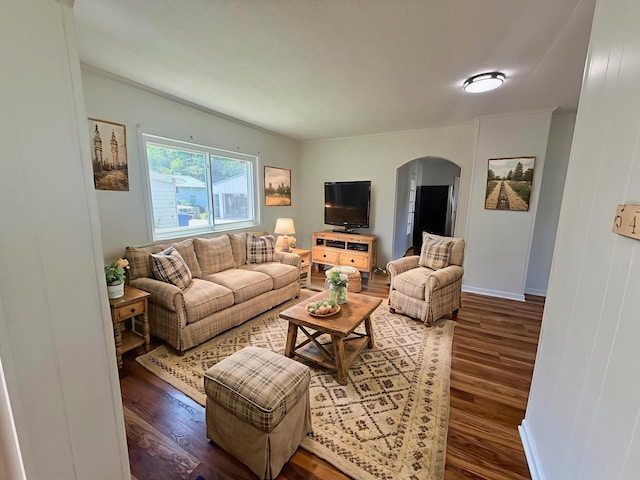 85 Blymer St, Delaware, OH 43015 - living area with arched walkways and wood finished floors