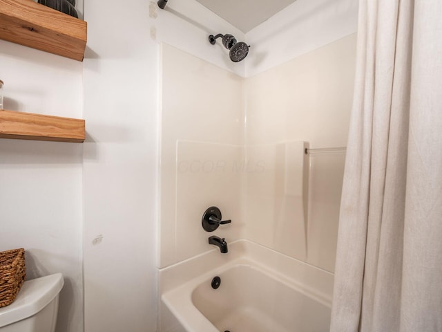 185 Frebis Ave, Columbus, OH 43206 - full bath featuring shower / bath combo with shower curtain and toilet