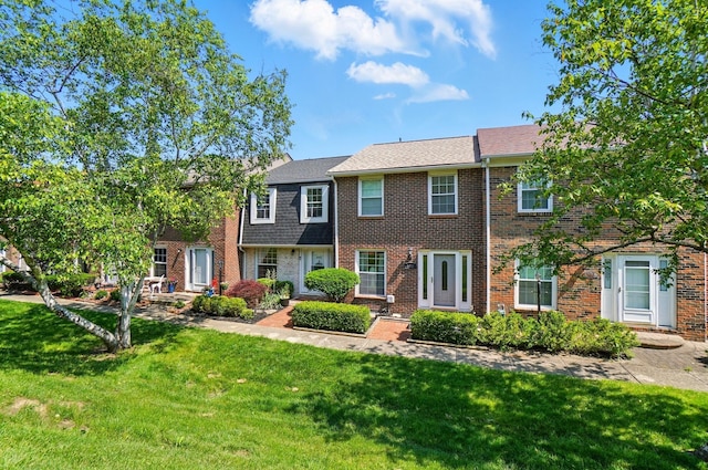 602 Dlyn St Unit H8, Columbus, OH 43228 - multi unit property with a front yard and brick siding