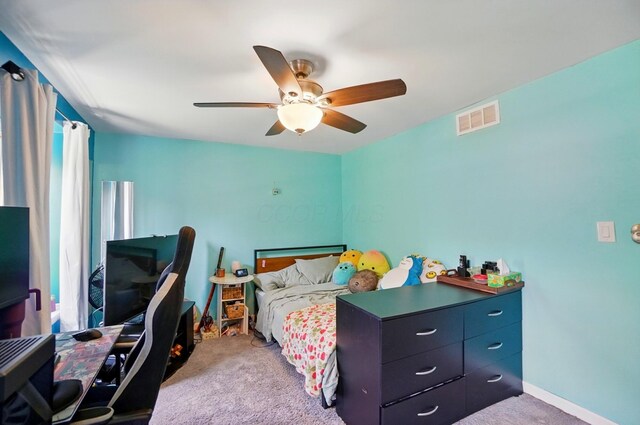 602 Dlyn St Unit H8, Columbus, OH 43228 - carpeted bedroom with an office area and a ceiling fan