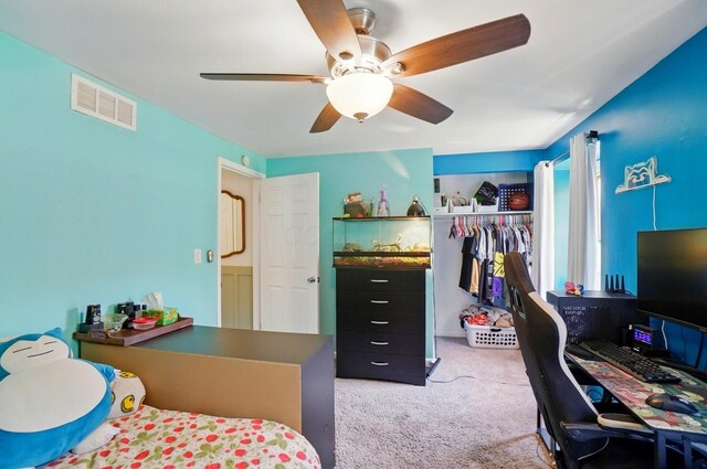 602 Dlyn St Unit H8, Columbus, OH 43228 - bedroom featuring light carpet, a closet, an office area, and a ceiling fan