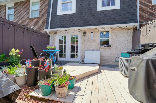 602 Dlyn St Unit H8, Columbus, OH 43228 - wooden terrace with french doors