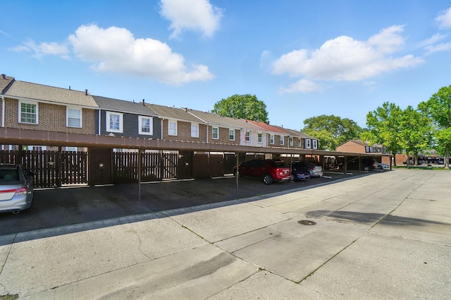 602 Dlyn St Unit H8, Columbus, OH 43228 - covered parking lot featuring a residential view