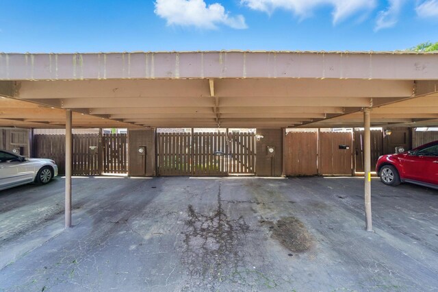 602 Dlyn St Unit H8, Columbus, OH 43228 - covered parking lot with a gate