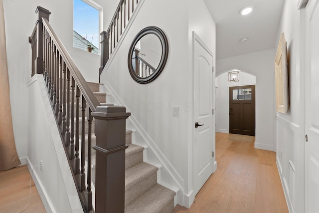 5431 Goose Falls Dr, Dublin, OH 43016 - staircase with arched walkways, wood finished floors, plenty of natural light, and recessed lighting