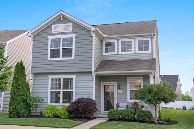 5431 Goose Falls Dr, Dublin, OH 43016 - view of front of house featuring a front lawn, roof with shingles, and a porch