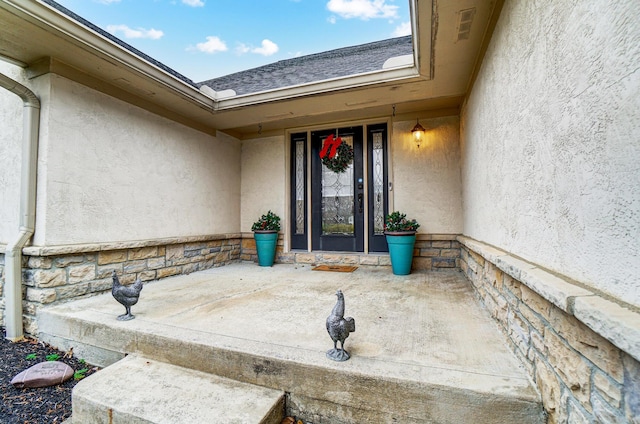 2474 Marthas Wood, Grove City, OH 43123 - doorway to property featuring stucco siding and stone siding