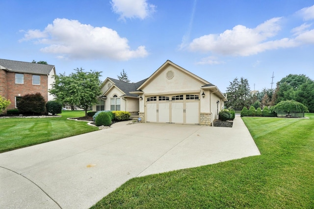 2474 Marthas Wood, Grove City, OH 43123 - view of front of house featuring stucco siding, an attached garage, driveway, a front lawn, and stone siding