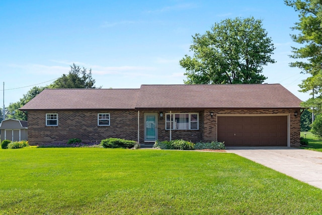 12475 Oak Dr, Orient, OH 43146 - single story home with brick siding, an attached garage, driveway, and a front yard