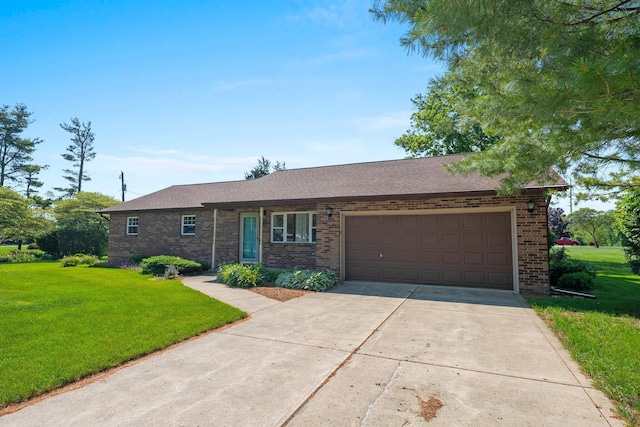 12475 Oak Dr, Orient, OH 43146 - ranch-style house with brick siding, a garage, driveway, a front lawn, and a shingled roof