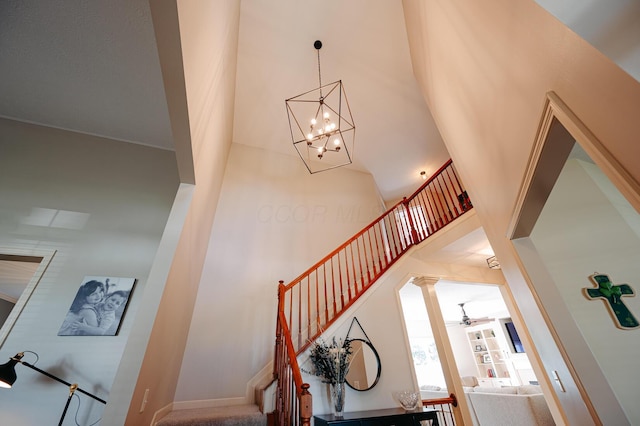 4401 Kathryns Way, Hilliard, OH 43026 - staircase with a high ceiling, a chandelier, and ceiling fan