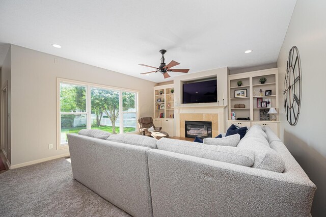 4401 Kathryns Way, Hilliard, OH 43026 - carpeted living area with a fireplace, ceiling fan, and recessed lighting