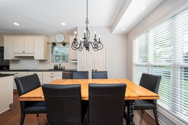 4401 Kathryns Way, Hilliard, OH 43026 - dining room with a chandelier, dark wood-style flooring, and recessed lighting