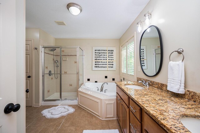 4401 Kathryns Way, Hilliard, OH 43026 - full bathroom with a garden tub, double vanity, a shower stall, and tile patterned flooring