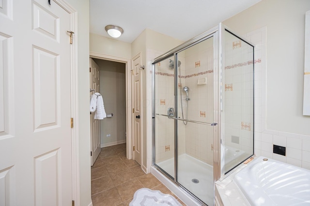 4401 Kathryns Way, Hilliard, OH 43026 - full bathroom featuring a shower stall, a bath, and tile patterned floors