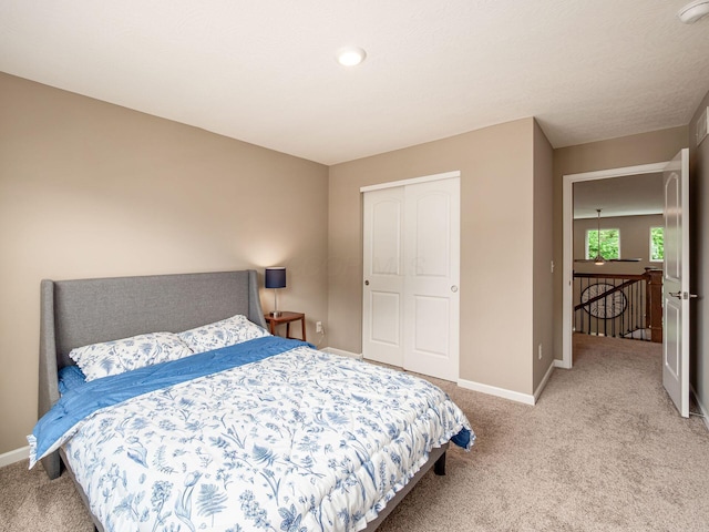 404 Colony Ridge Dr, Delaware, OH 43015 - bedroom featuring light carpet and a closet
