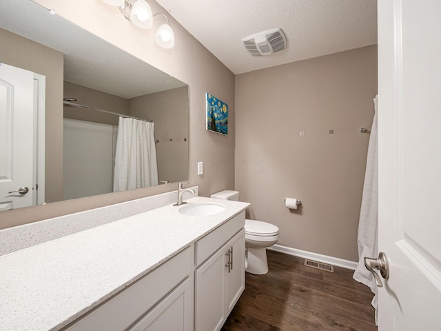 404 Colony Ridge Dr, Delaware, OH 43015 - full bathroom with vanity, wood finished floors, and curtained shower