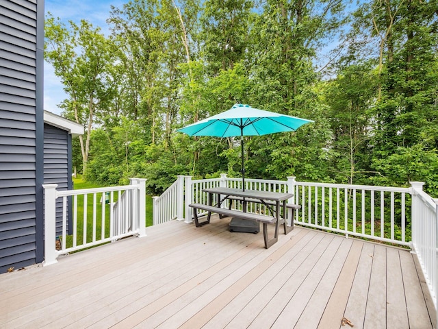404 Colony Ridge Dr, Delaware, OH 43015 - wooden terrace featuring outdoor dining area and view of scattered trees