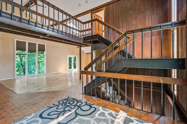 933 Creek Run Ct, Westerville, OH 43081 - stairway with brick patterned flooring and a high ceiling