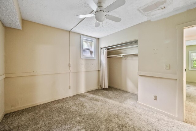 933 Creek Run Ct, Westerville, OH 43081 - unfurnished bedroom with carpet floors, a closet, a textured ceiling, and ceiling fan