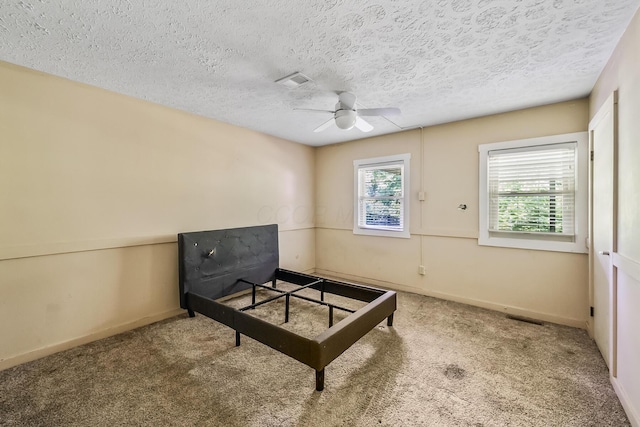 933 Creek Run Ct, Westerville, OH 43081 - carpeted bedroom with a textured ceiling and ceiling fan