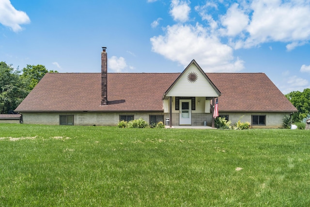 5795 Royalton Rd SW, Lancaster, OH 43130 - view of front of property featuring roof with shingles, a front lawn, and a chimney