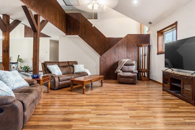 5795 Royalton Rd SW, Lancaster, OH 43130 - living room featuring light wood-style floors, a ceiling fan, and high vaulted ceiling
