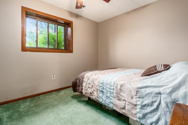 5795 Royalton Rd SW, Lancaster, OH 43130 - bedroom featuring carpet floors, a ceiling fan, and a textured ceiling