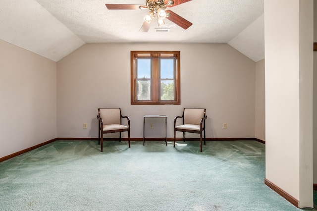 5795 Royalton Rd SW, Lancaster, OH 43130 - sitting room with carpet, vaulted ceiling, ceiling fan, and a textured ceiling