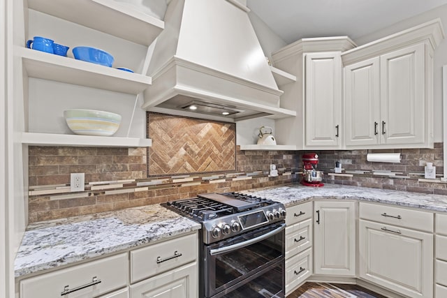 19694 State Route 60, Warsaw, OH 43844 - kitchen with open shelves, double oven range, premium range hood, tasteful backsplash, and white cabinets