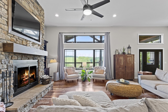 19694 State Route 60, Warsaw, OH 43844 - living area featuring plenty of natural light, recessed lighting, a stone fireplace, ceiling fan, and wood finished floors