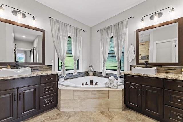 19694 State Route 60, Warsaw, OH 43844 - bathroom featuring plenty of natural light, two vanities, and a garden tub