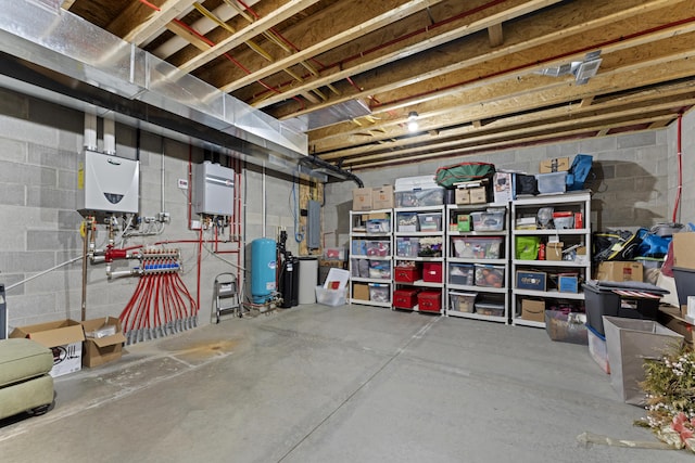 19694 State Route 60, Warsaw, OH 43844 - unfinished below grade area featuring a water pressure tank, electric panel, concrete block wall, and tankless water heater